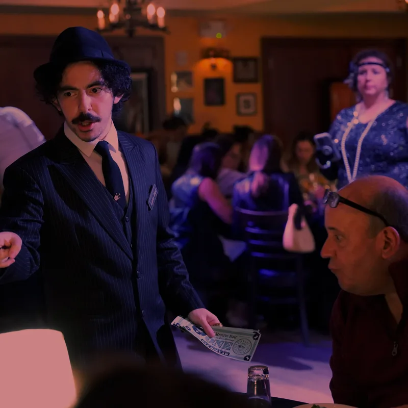 A detective questioning a guest at a Kansas City show