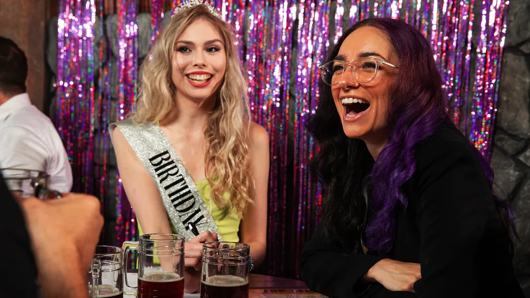 Guests celebrating at a Kansas City murder mystery party